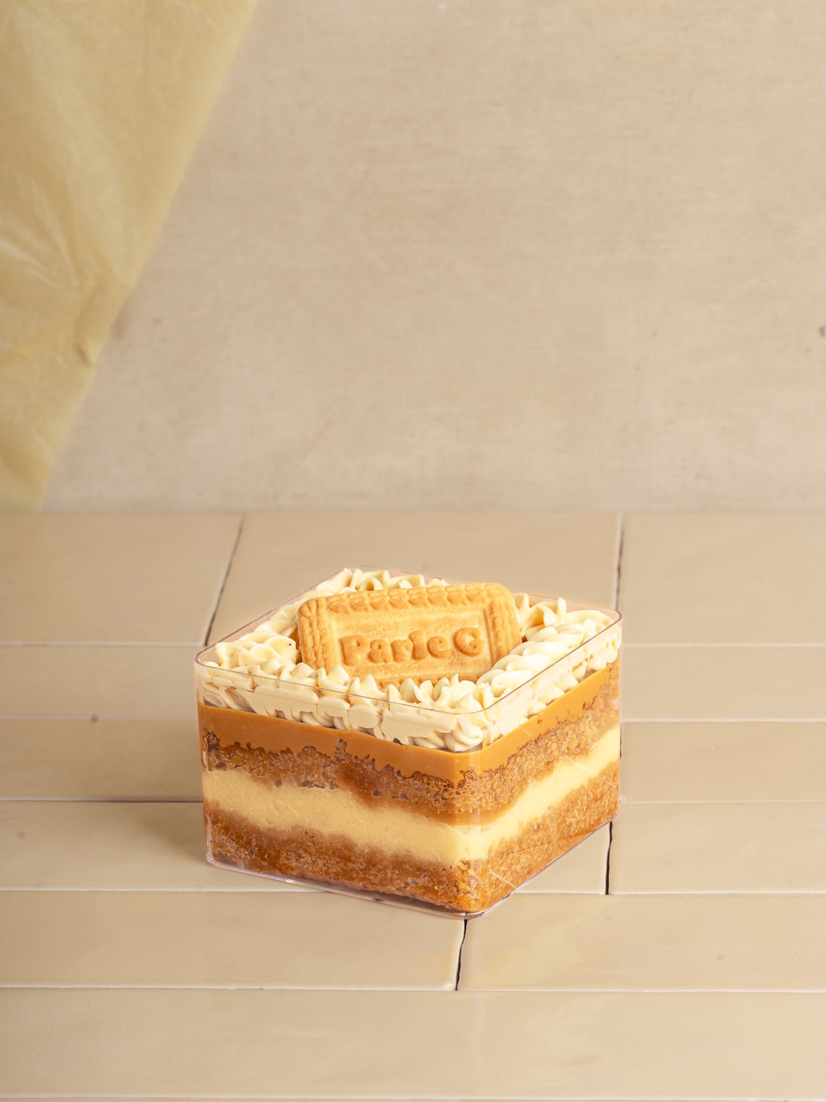 Chai Cake With Parle-g Biscuit Infused Custard And Lotus Biscoff Ganache