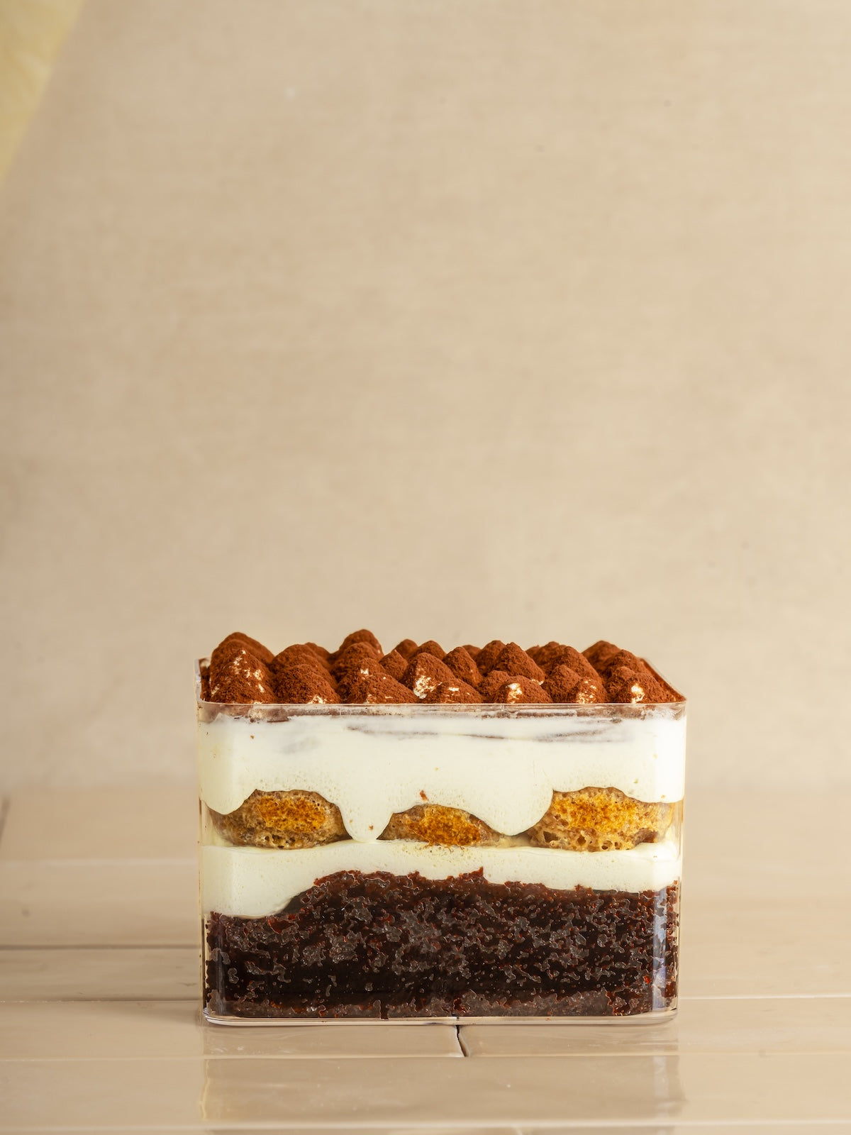 Chocolate tiramisu cake with filter coffee soaked fingers & mascarpone frosting