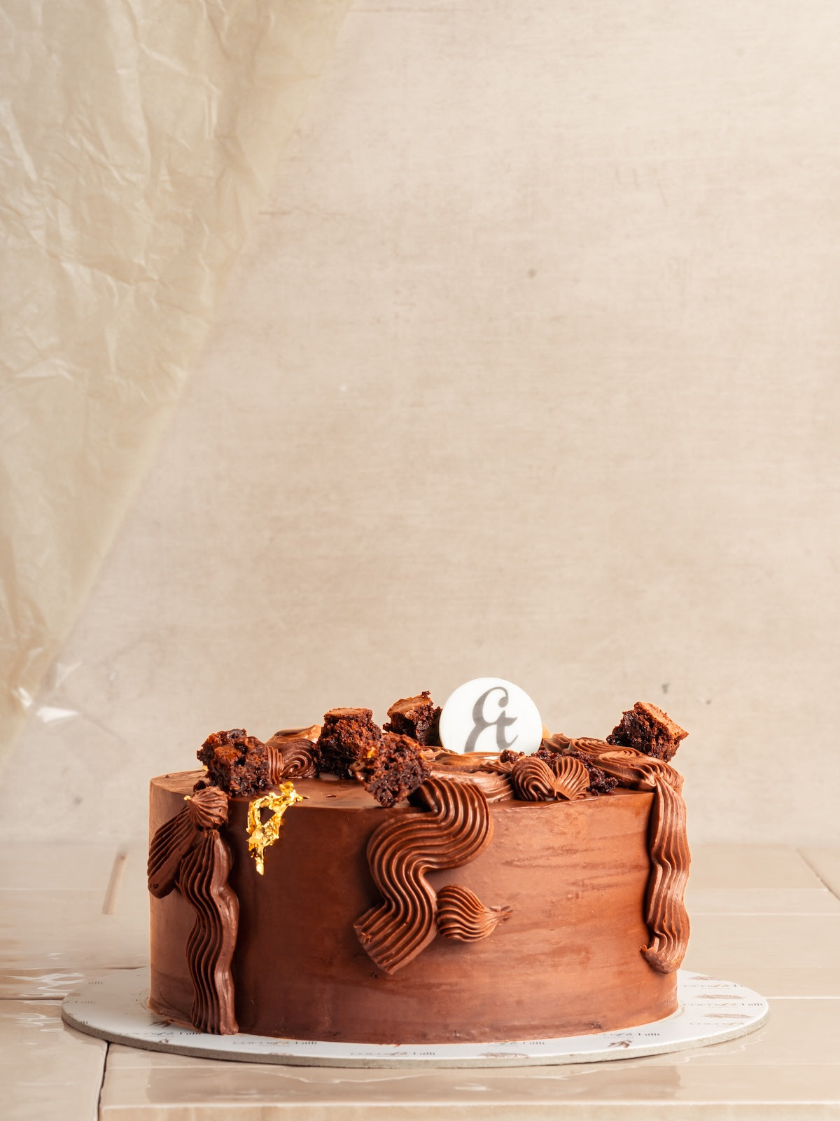 Chocolate cake w/ fudge sauce & dark chocolate ganace