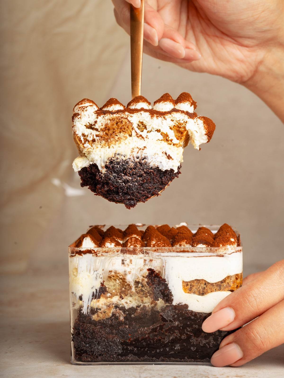 Chocolate tiramisu cake with filter coffee soaked fingers & mascarpone frosting